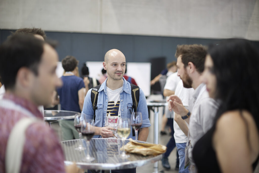 ECR volcanologists chat during the IUGG23 ECS social event